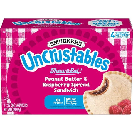 Smucker's Smucker’s Uncrustables Peanut Butter & Raspberry Spread Sandwiches, 4 Count - Green Basket Marco Island